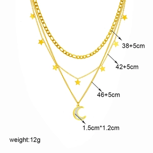 Layered gold titanium necklace with star and moon pendants, 38 to 46 cm length, 12g weight