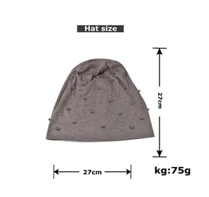 Size chart showing 27cm x 27cm dimensions for this grey knitted beanie with pearl beads