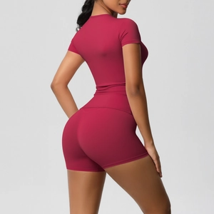 Detail view of burgundy high-elastic athletic set showing texture and back slim fit cut
