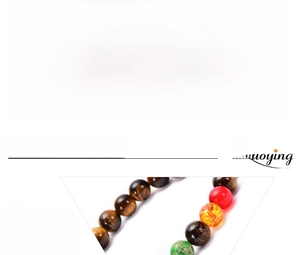 Detail of handmade tiger eye stone bracelet with 8mm beads and Buddha head charm