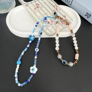 Bohemian evil eye phone charms in blue and gold pink resin beads for phone case security