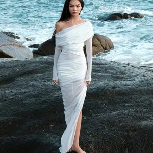 Elegant white mesh off-shoulder ruched maxi dress with sheer sleeve and slim silhouette