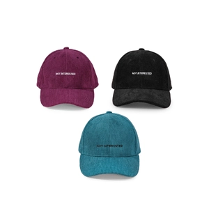 Corduroy baseball caps with NOT INTERESTED embroidery in purple, black and blue colors