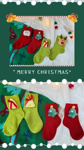 Detailed knit of Christmas socks with 3D Santa, reindeer, and tree doll decorations