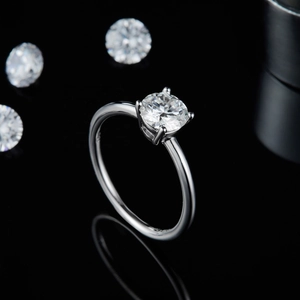 Minimalist S925 sterling silver ring with 1-carat round moissanite in professional studio setting