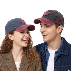 Stylish washed cotton baseball cap featuring detailed 3D maple leaf embroidery on front