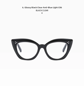Detail of oversized black cat-eye frames with anti-blue light clear lenses and triple studs