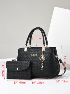 Detailed view of black woven tote bag and clutch set with precise size measurements