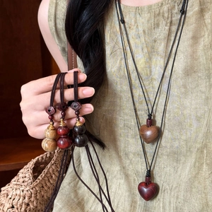 Vintage hand-carved wood heart and gourd pendant necklace with woven cord for women