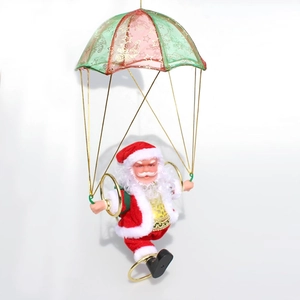 Detail of Santa Claus parachute decoration with red and green tulle and gold stars