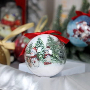 8cm foam Christmas ball ornament with snowman scene and red ribbon on white fabric