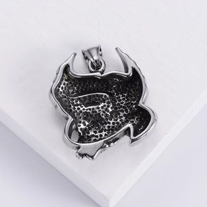 Punk style stainless steel eagle head motorcycle pendant shown from back perspective