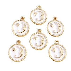 Golden round celestial pendants with white enamel moon and stars in a pack of eight
