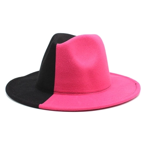 Vue détaillée du chapeau fedora bicolore en laine contrastant noir et rose vif éclatant