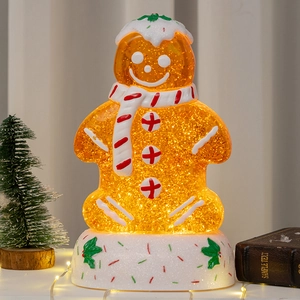 LED Gingerbread Man snow globe ornament with sparkling gold glitter for Christmas gift