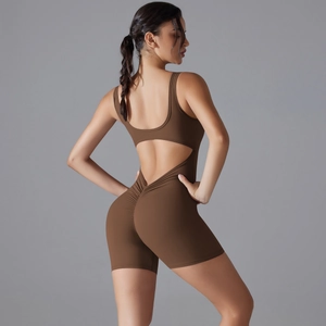 Detail of brown backless yoga romper featuring scrunch butt and V-waist fitness design