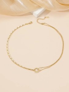 Gold-toned asymmetrical box and bead chain necklace featuring a polished Roman ring pendant