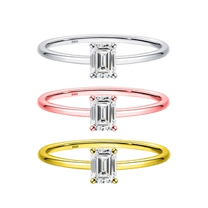 Detailed stack of silver, gold, and rose gold S925 sterling silver emerald cut rings