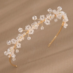 Exquisite gold crystal floral bridal headband with shimmering rhinestone vine details