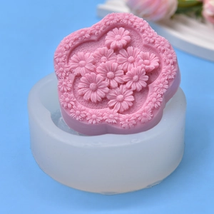 Pink daisy flower silicone mold for handmade soap and candle making with 3D floral pattern