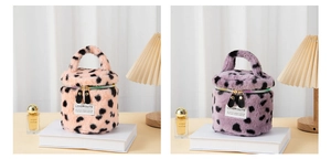 Pink and purple leopard print plush makeup bags with LOVE YOUTH labels and carry handles