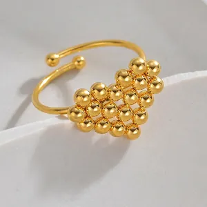 Minimalist gold heart ring in stainless steel with polished beads and open adjustable band