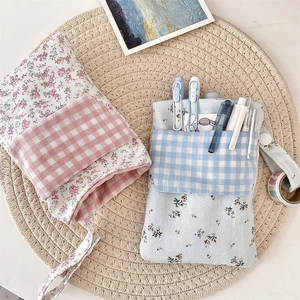Dual-layer nurse pen pouch set in floral and checkered fabric with handy carry strap