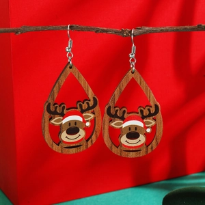 Detail shot of wooden reindeer earrings with festive hollow teardrop frame design