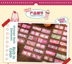 Macro detail of retro strawberry dessert stickers with cute cartoon cat patterns