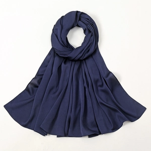 Elegant navy blue silk-feel satin hijab with lightweight draped fabric and soft texture