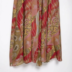 Bohemian floral midi dress with abstract red and pink patterns on lightweight chiffon