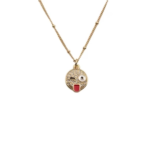 Gold smiling emoji necklace with sparkling zircons and colorful enamel pendant on a bead chain