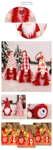 Detail of knitted Valentine gnome with heart patterns, LED lights and battery compartment