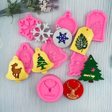 Detailed pink silicone molds featuring snowflakes and reindeer for Christmas cake decoration