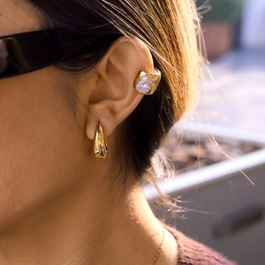 Classic 18K gold-plated teardrop zircon ear cuff and smooth earring on female model
