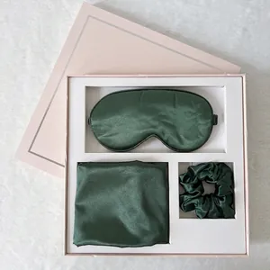 Luxury dark green satin sleep set with eye mask, pillowcase and scrunchie in a pink gift box