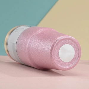 Detailed view of pink glitter textured 30oz stainless steel tumbler with sparkling finish