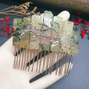 Handmade forest style hair comb with natural green crystal stones and silver branch detail