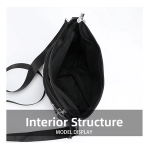 Internal structure of black gothic skull crossbody bag showing main storage compartment