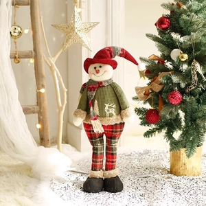 Standing plush Christmas snowman doll with festive red scarf and knitted deer sweater