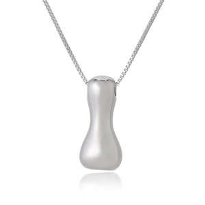 Close-up of a polished silver irregular hourglass pendant on a delicate chain necklace