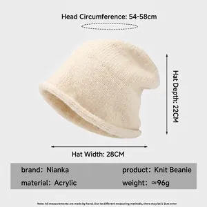 Beige knitted beanie for women with rolled edges and detailed size specifications