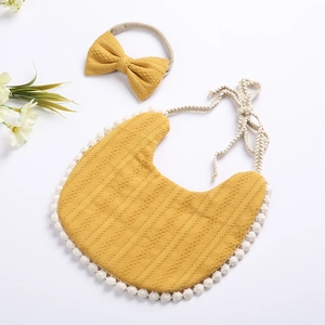 Baby cotton linen bib and headband set in mustard yellow with white tassel fringe