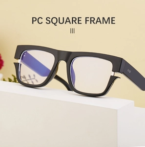 Detail of square black PC frame sunglasses showing anti-blue light coating on lens