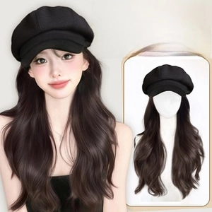 Detail showing high-quality black newsboy cap with long wavy dark brown hair extensions