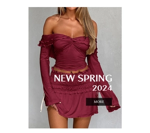 Detail of burgundy off-shoulder long sleeve crop top with ruched skirt set