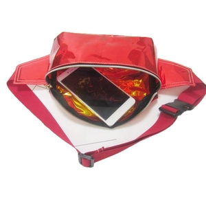 Metallic red holographic waist bag with adjustable strap and zipper closure for outdoors