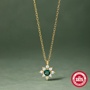 Elegant S925 sterling silver flower necklace with a green gemstone and white zircons