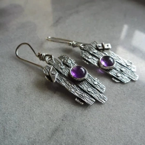 Bohemian vintage earrings with purple gemstones and engraved silver textured metal finish