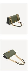 Close-up of dark green quilted shoulder bag with golden metal buckle and chain strap